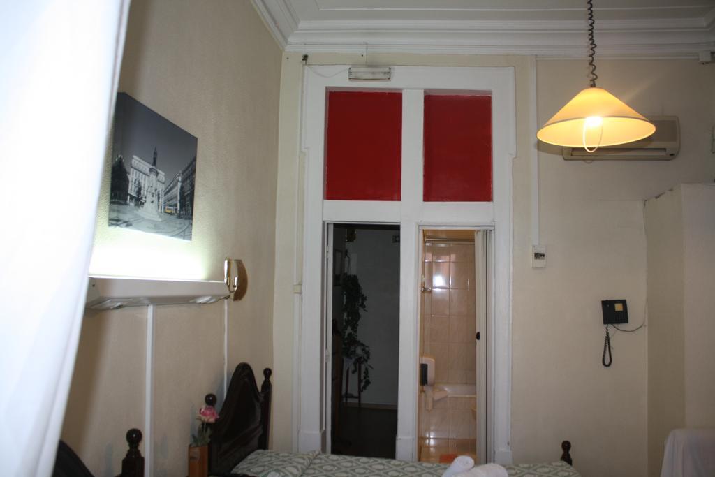 Pensao Residencial Estrela Do Mondego Hotel Lissabon Kamer foto